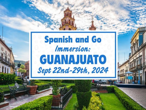 Vibrant image showing the picturesque city of Guanajuato with its colorful buildings and unique topography. Overlaid text announces the Spanish Immersion Retreat dates: 'Fall 2024, September 22nd to 29th.